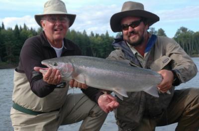 A  photo of one of the largest Steelhead caught at the camp this season. On the left is AAG Rick Morrison and on the right AG Dustin Kovacvich.  Photo credit goes to Keith Cuddeback.  Thank you very much Keith for sending it to me.